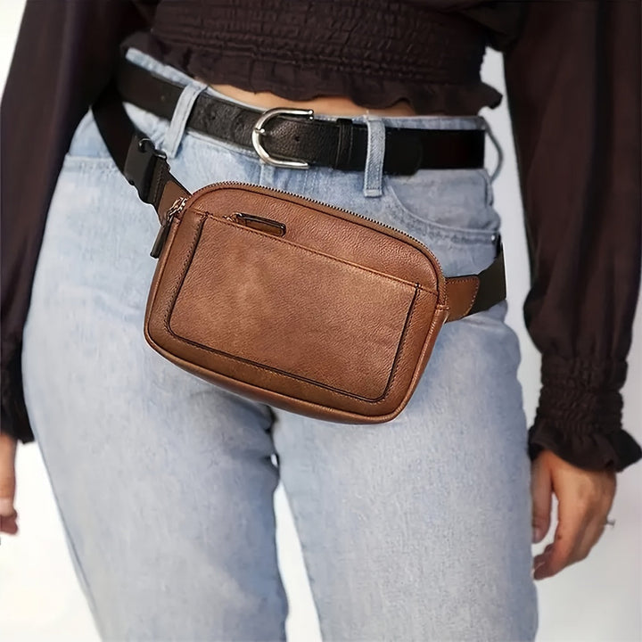 Interno borsa a tracolla unisex con scomparti multipli per organizzazione ottimale in viaggio e quotidianità.