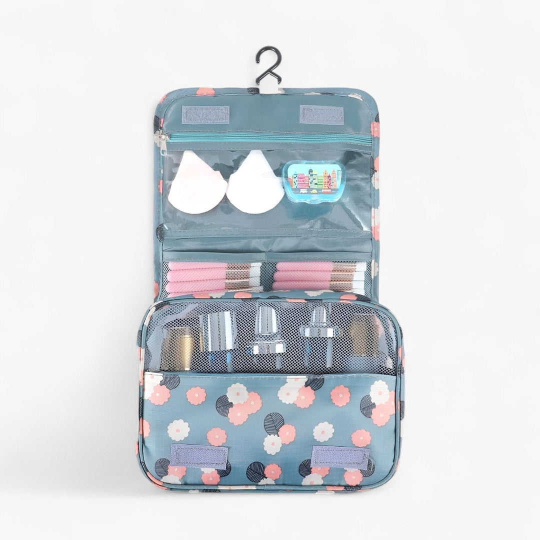 Borsa toilette da viaggio floreale per donna, con scomparti multipli, accessorio essenziale per organizzare il trucco.