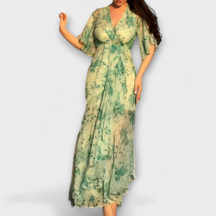 Abito donna elegante e confortevole, con fantasia floreale e scollo a V, ottimo per eventi e tempo libero.