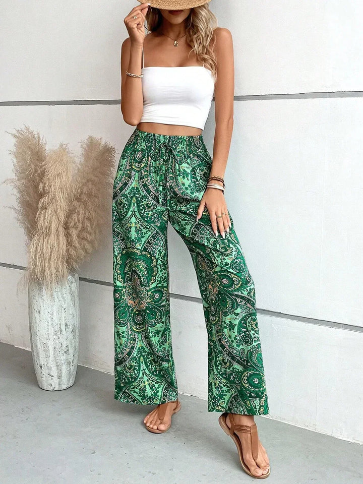 Pantaloni larghi floreali da donna, vestibilità ampia e stampa estiva, per un tocco di stile casual.