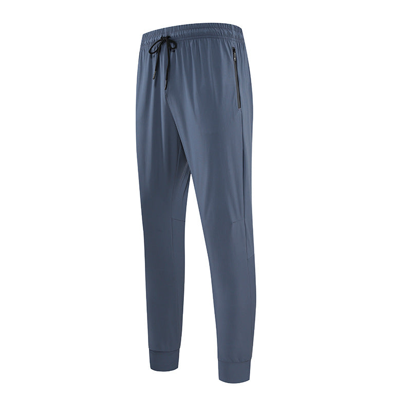 Pantaloni larghi uomo, abbigliamento sportivo primavera estate. Comfort e traspirabilità per fitness e casual.