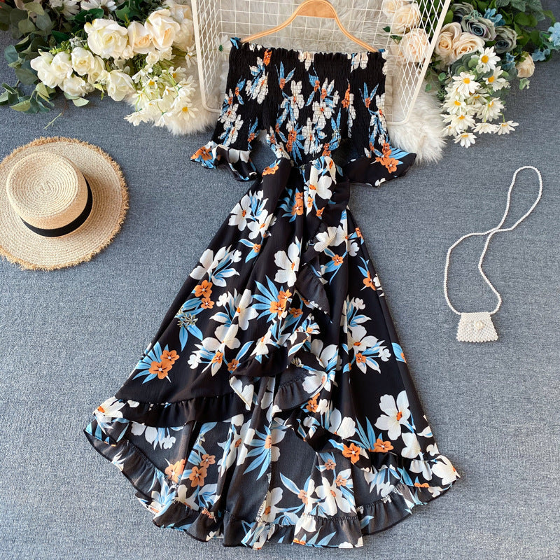 Abito midi estivo da donna con spalle scoperte e volant, perfetto per look casual o eleganti.