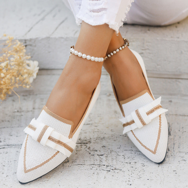 Ballerine basse da donna con fiocco, offrono comfort quotidiano e uno stile elegante per ogni occasione.