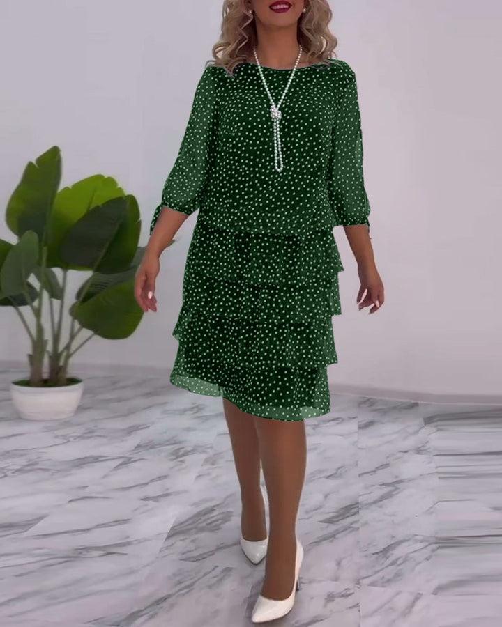 Abbigliamento donna: abito a pois con gonna fluida, maniche a 3/4. Vestito elegante e comodo per ogni occasione.