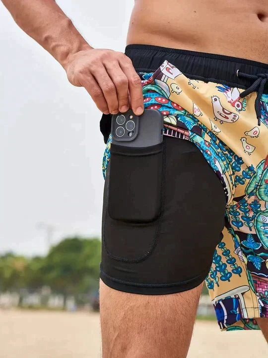 Costume uomo corto in tessuto tecnico, ideale per spiaggia, nuoto e attività estive.