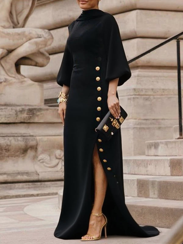 Vestito maxi elegante donna nero con maniche a sbuffo e collo alto, perfetto per serate chic e cerimonie.
