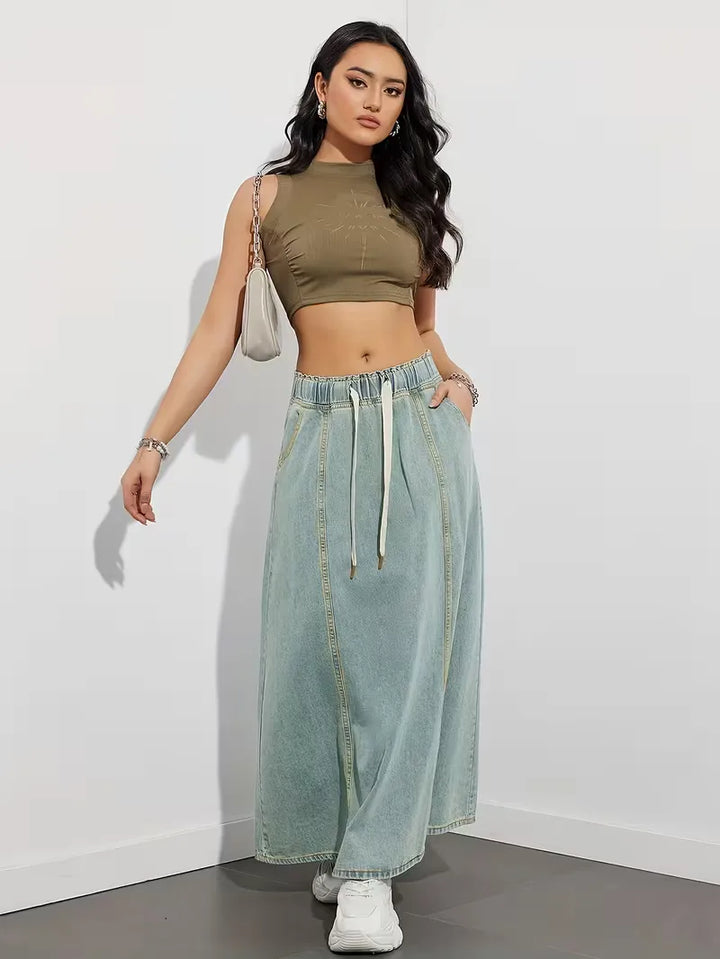 Gonna denim maxi per donna, vita elasticizzata, versatile per abbinamenti casual e quotidiani.