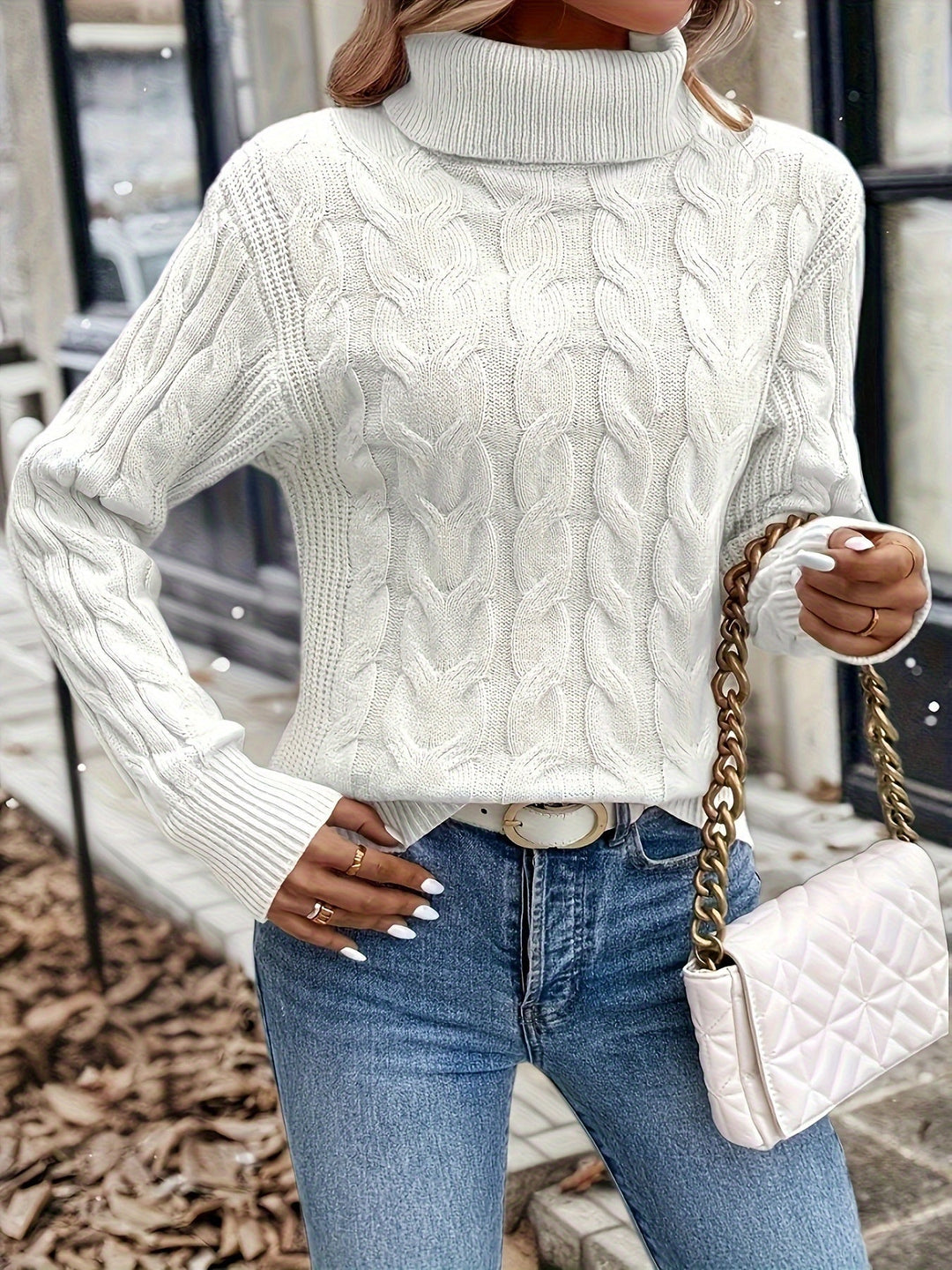 Maglia donna avvolgente con collo alto e trecce. Per un comfort lussuoso in inverno.