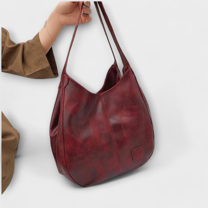 Borsa classica da donna in finta pelle, stile vintage, ideale per l'eleganza quotidiana.