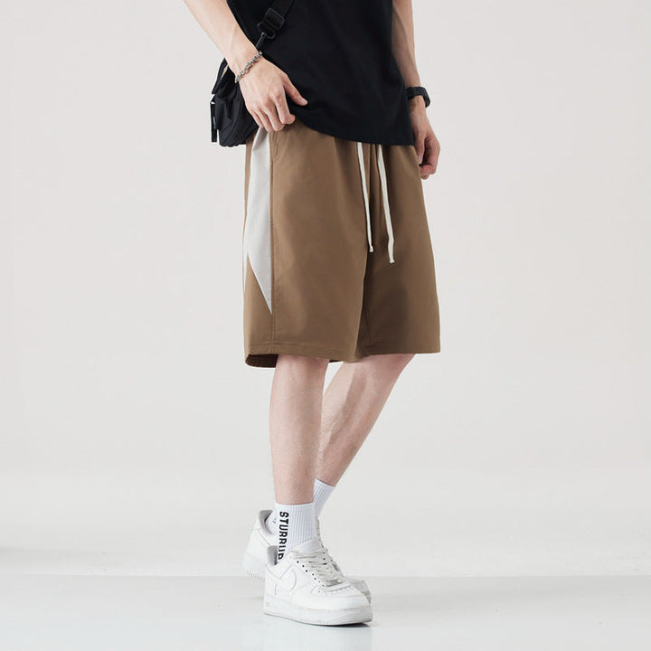 Pantaloncini leggeri uomo per l'estate, taglio ampio e dritto per un look casual e fresco.