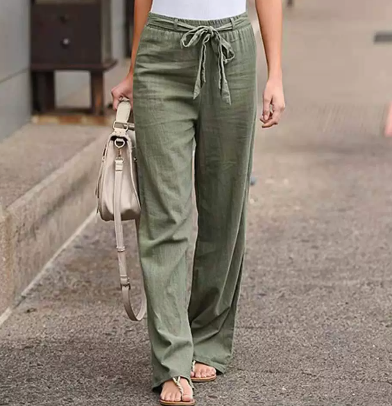 Pantaloni comodi donna in lino, vita alta elastica, gamba larga per un look estivo chic e alla moda.