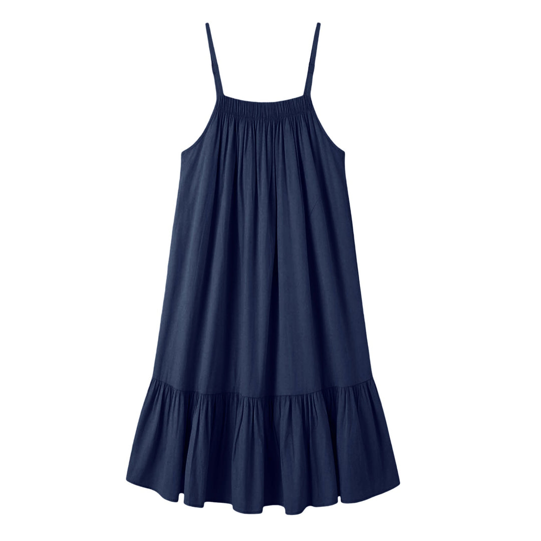 Immagine di abito estivo donna fluido con spalline sottili, stile disinvolto e alla moda.