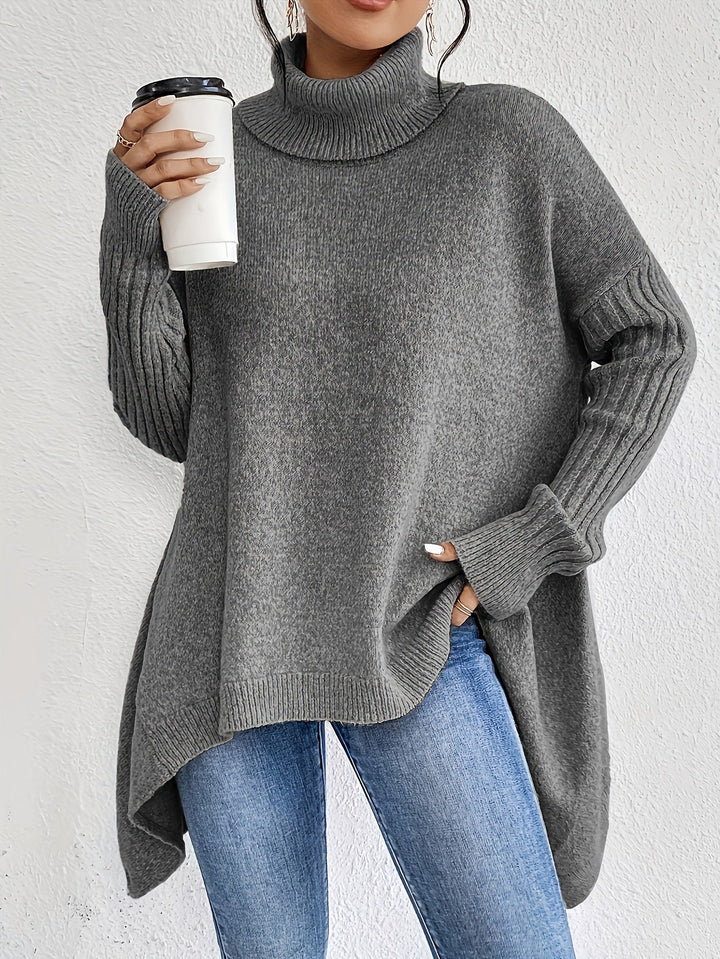 Pullover dolcevita donna con taglio ampio, ideale per il comfort e uno stile rilassato e chic.
