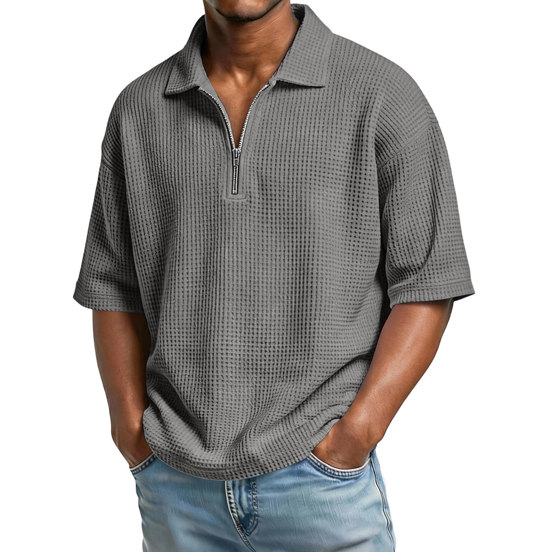 Polo uomo estiva a nido d'ape, vestibilità regolare per massimo comfort. Un must per l'abbigliamento estivo.