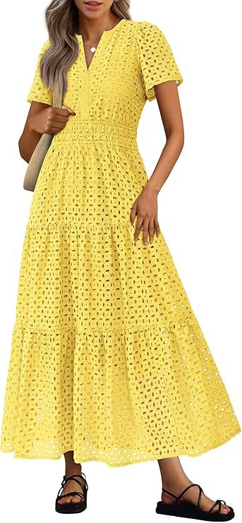 Abito fluido da donna, maxi lunghezza, scollo a V, maniche corte. Stile estivo rilassato.
