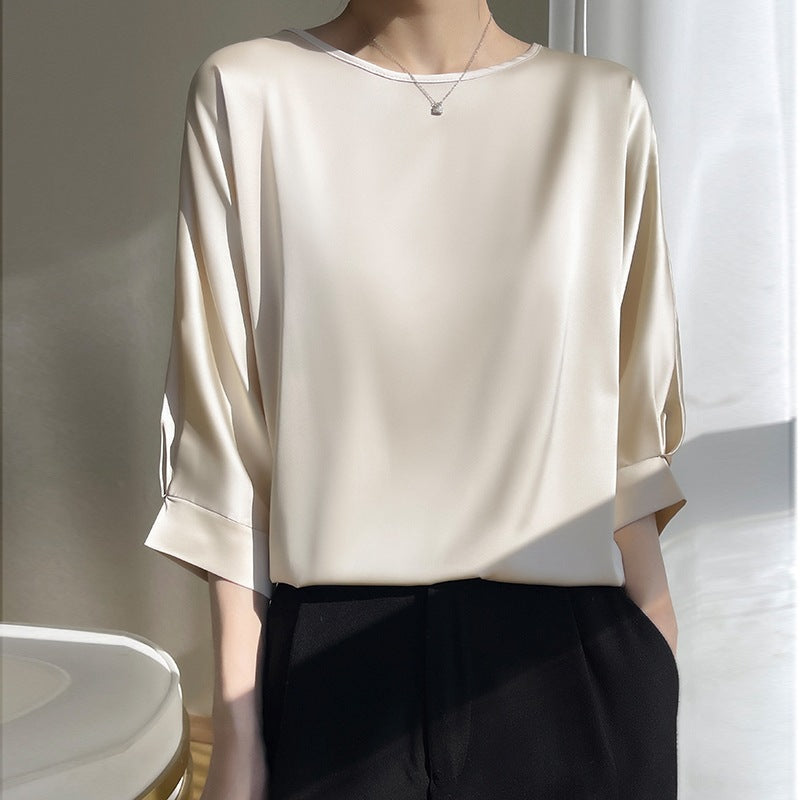 Camicetta donna elegante per ufficio, scollo tondo. Leggera e confortevole per un look professionale e fresco.