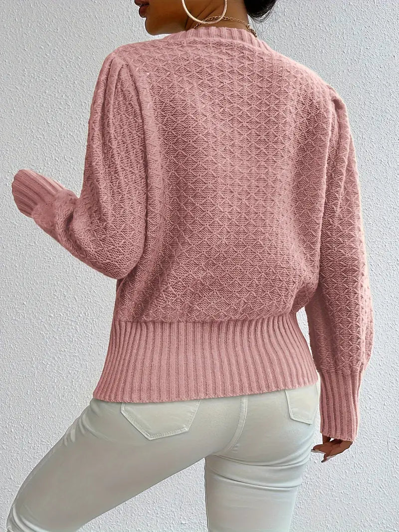 Maglione donna elegante con maniche a sbuffo, stile lavorato a maglia. Perfetto per outfit casual e chic.