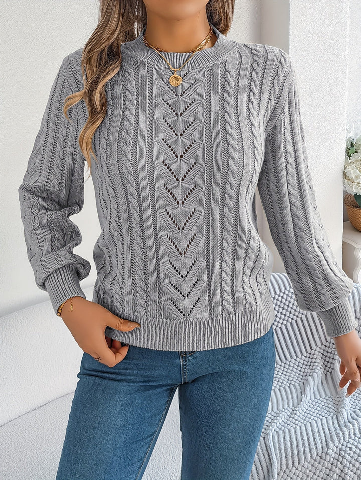Maglione donna girocollo in maglia a trecce. Maniche lunghe, caldo e alla moda.