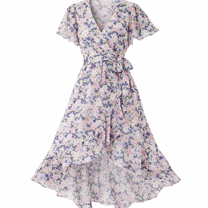 Abito estivo floreale midi, per un look femminile di tendenza. Perfetto per vacanze.