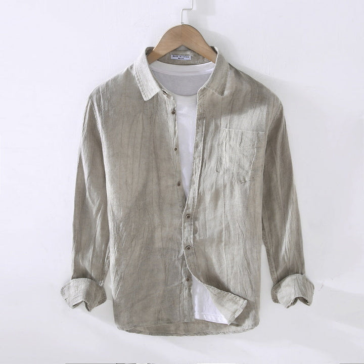 Camicia estiva da uomo casual, maniche lunghe e taglio ampio. Ideale per viaggi, vacanze o un outfit quotidiano rilassato.