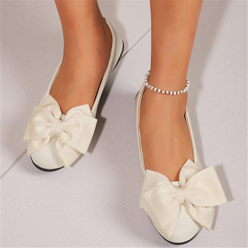 Scarpe donna slip-on con fiocco, mocassini comodi ideali per l'eleganza casual, moda femminile.