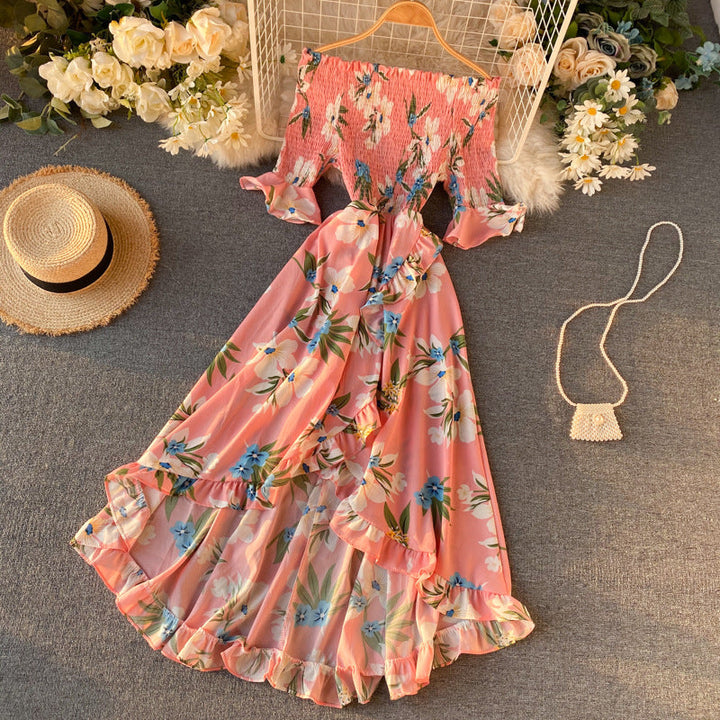 Abito da vacanza midi donna estivo, con spalle scoperte e volant, per un look spensierato e solare.
