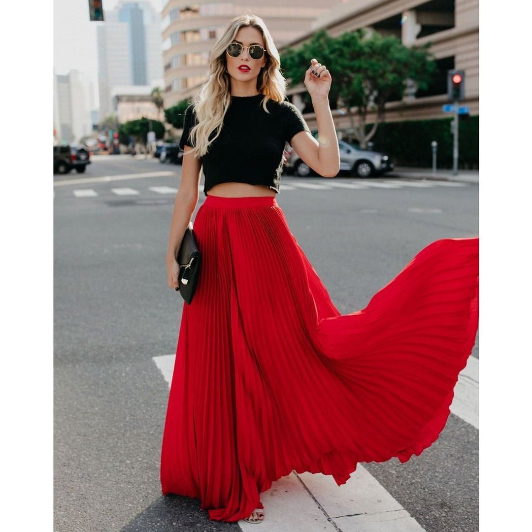 Gonna donna lunga e fluttuante, perfetta per un look estivo elegante e un outfit primaverile versatile.