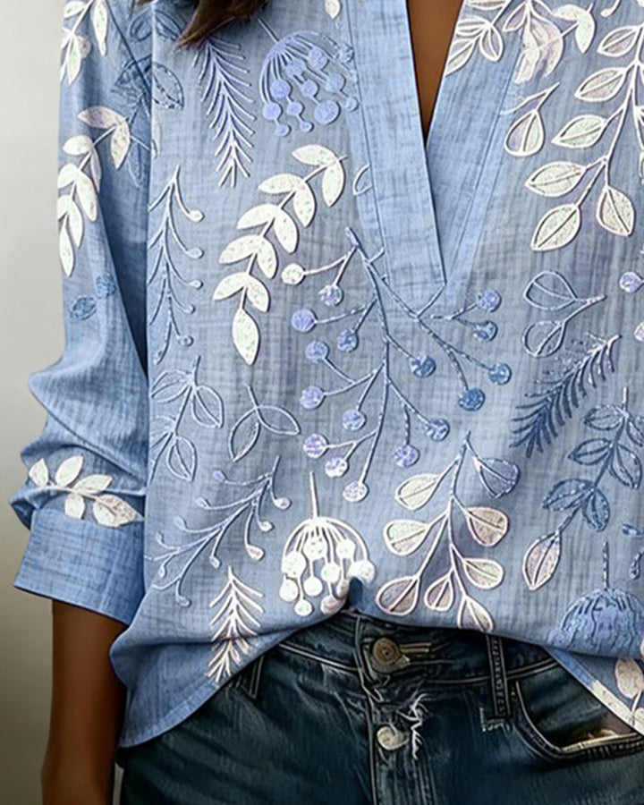 Blusa donna floreale con scollo a V lusinghiero e maniche tre quarti. Un capo essenziale per la bella stagione.