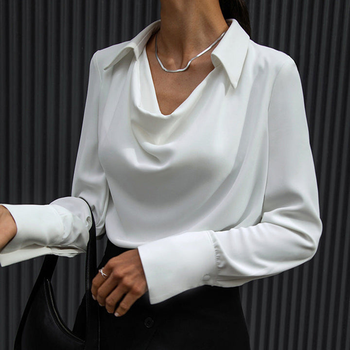 Camicia lunga donna elegante con collo drappeggiato in tinta unita, perfetta per outfit raffinati e versatili.