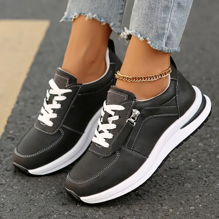 Sneakers donna Amelia nere, scarpe comode e casual per stile urbano. Calzature versatili per la moda quotidiana.