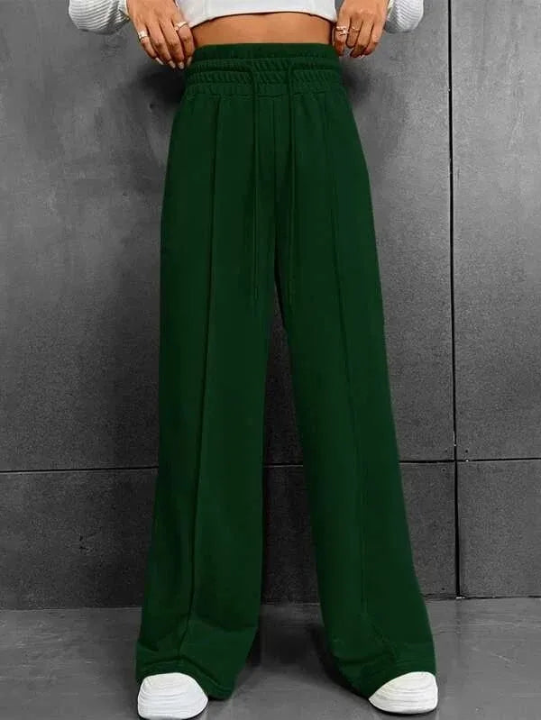 Pantaloni versatili donna, a gamba larga per un comfort ideale, perfetti per ogni outfit rilassato.