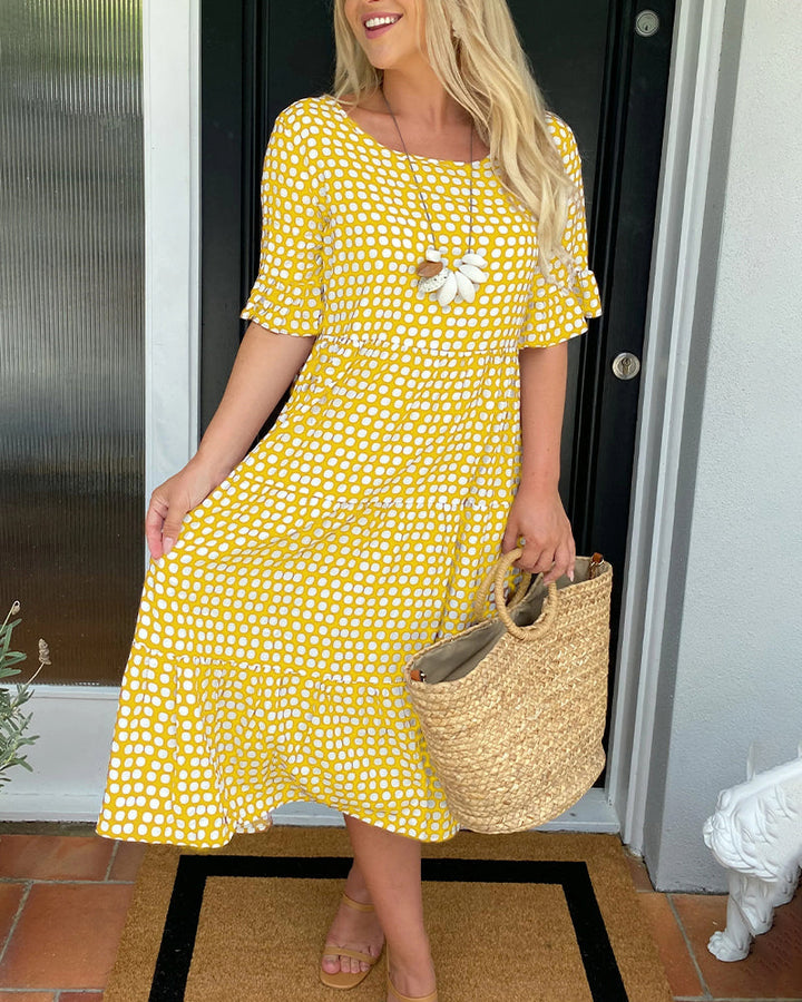 Elegante abito midi donna a pois, scollo rotondo, vestito estivo per look raffinato e leggero.