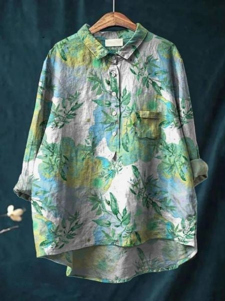 Blusa donna a fiori con colori vivaci, per un look estivo alla moda e versatile.