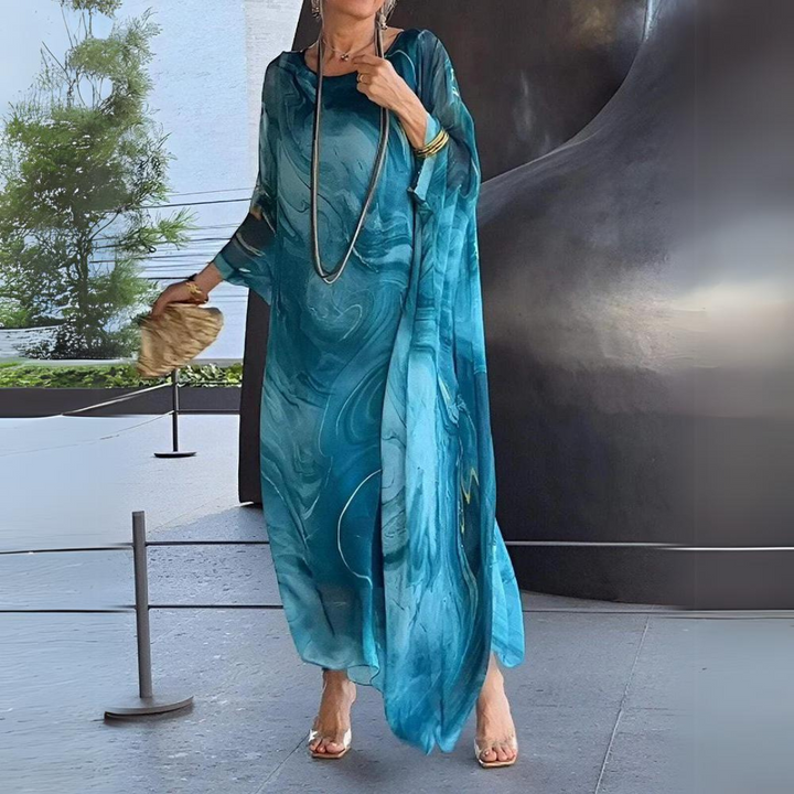 Abito lungo elegante in chiffon da donna, ideale per eventi serali e cerimonie.