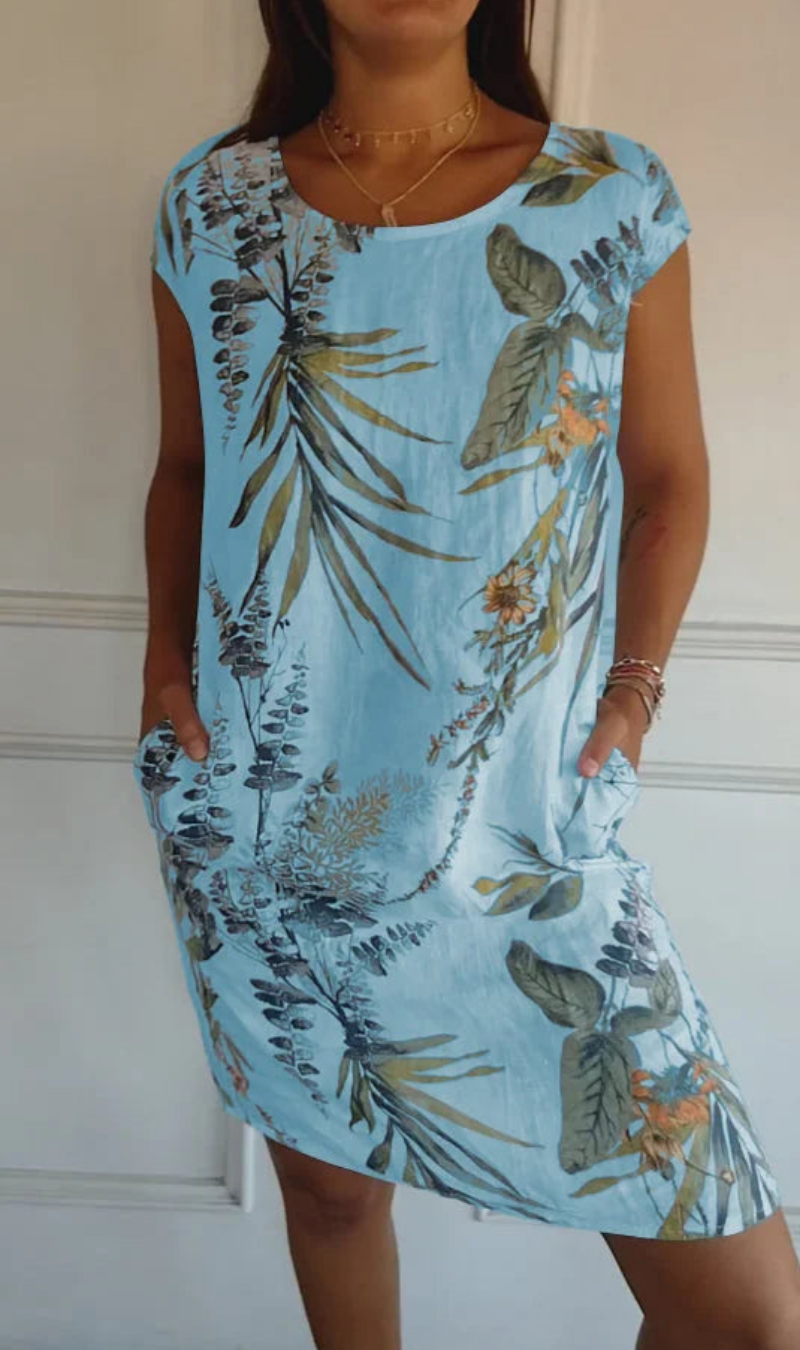 Abito donna con taglio fluido e stampa botanica, ideale per un comfort senza pari e stile.