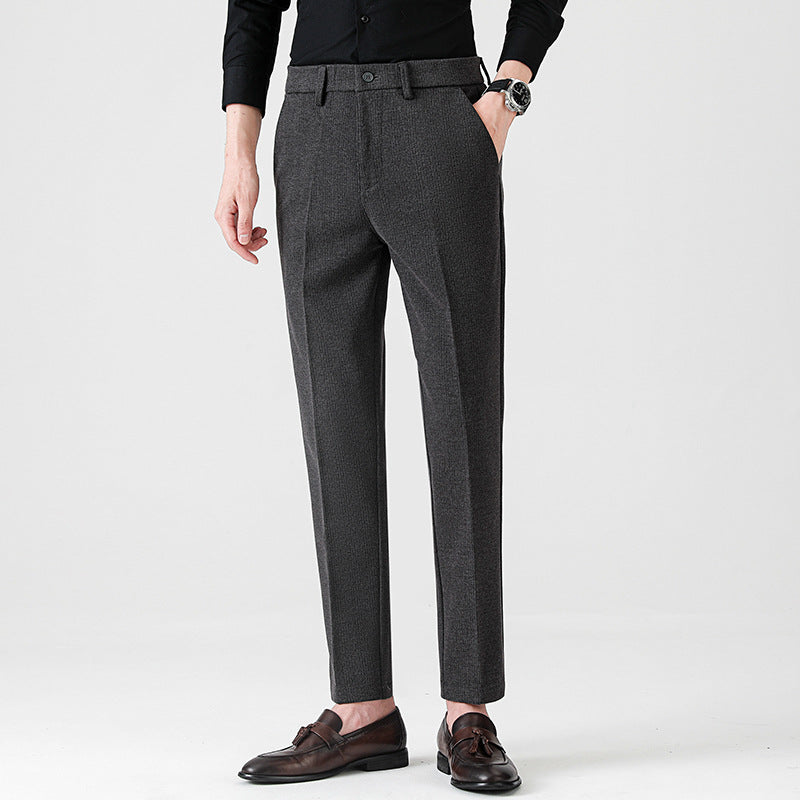Pantaloni uomo eleganti grigio scuro, versatili per business e cerimonia, taglio dritto, vita media, comfort elevato.