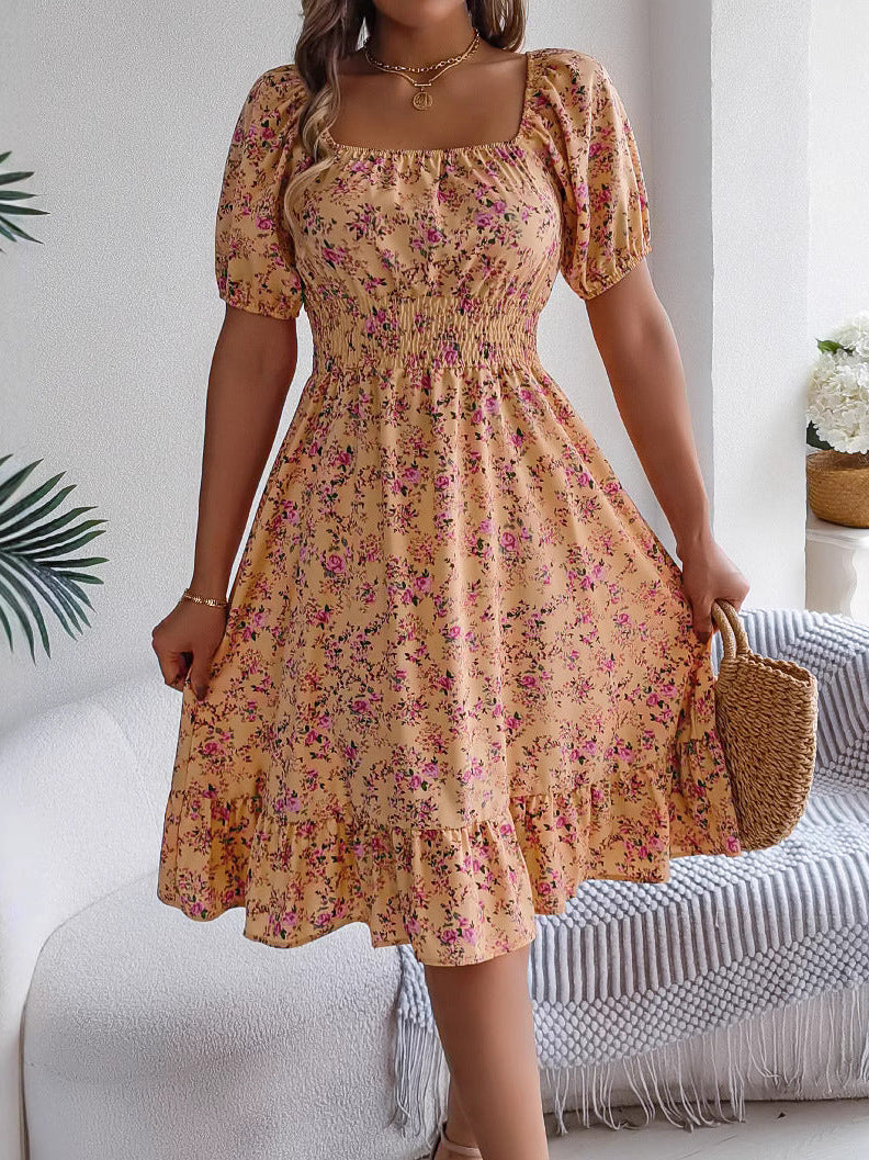 Elegante abito midi estivo floreale da donna, con vita alta e design multicolore, ideale per ogni occasione.