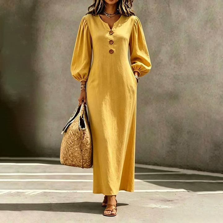 Abito maxi donna elegante con scollo a V e maniche a sbuffo, perfetto per l'estate, in poliestere multicolore.