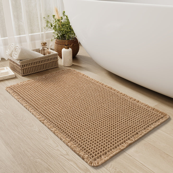 Tappetino da bagno design nido d'ape, assorbente e antiscivolo. Migliora il comfort e la sicurezza del bagno.