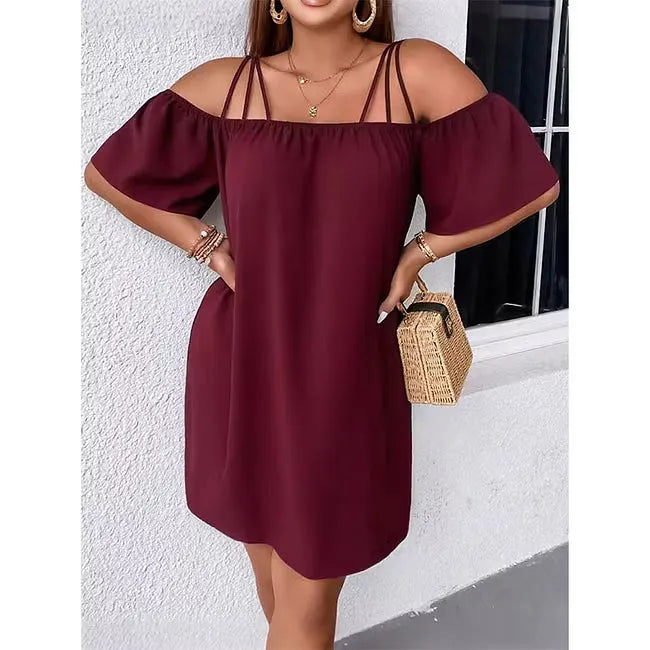 Moda femminile: vestito mini donna a spalle scoperte e spalline sottili, un must per l'estate.