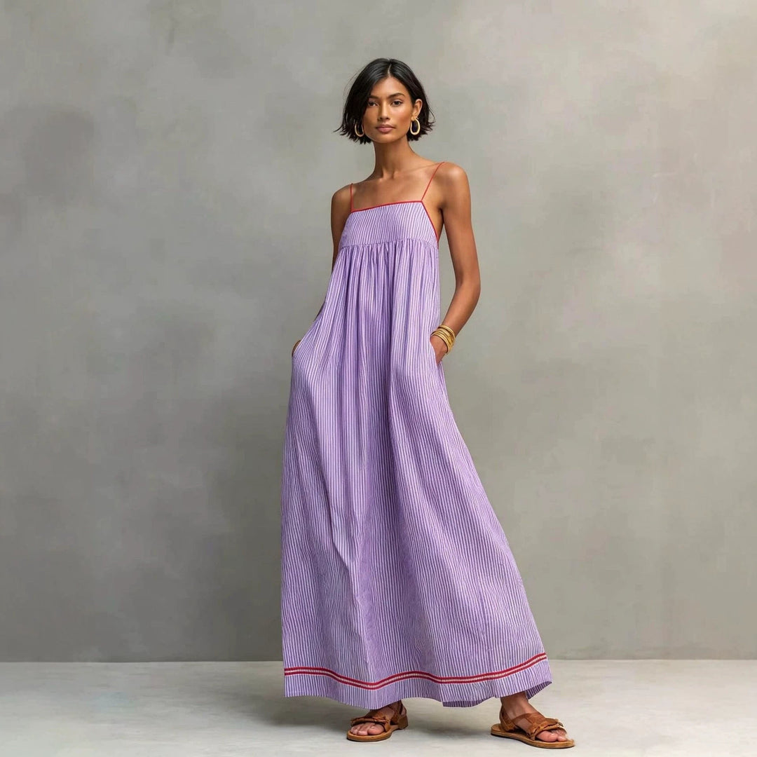 Abito donna maxi senza spalline, vestito estivo a vita alta, un capo essenziale per l'abbigliamento femminile.