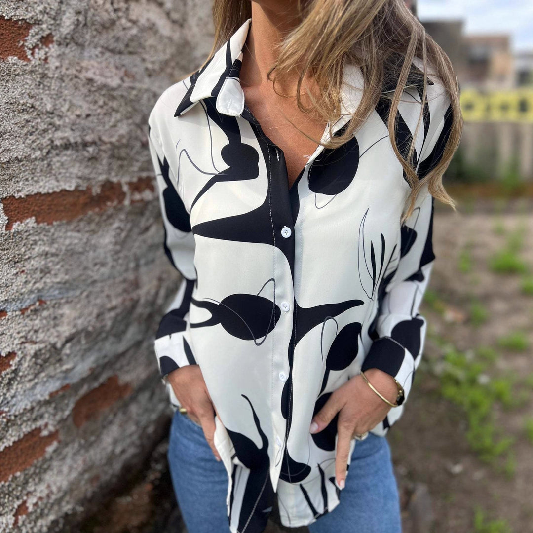 Camicia da donna a manica lunga con stampa effetto 3D, ideale per outfit autunnale. Stile femminile elegante e confortevole.