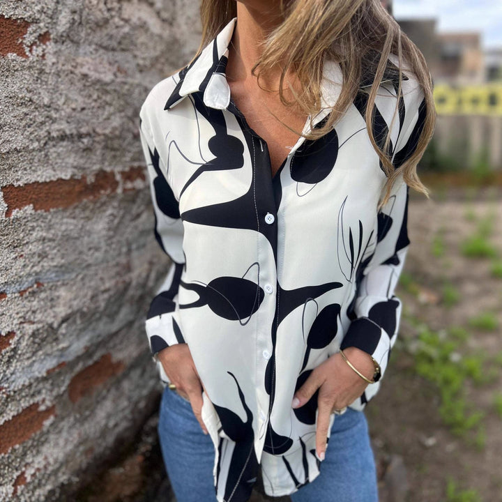 Camicia da donna a manica lunga con stampa effetto 3D, ideale per outfit autunnale. Stile femminile elegante e confortevole.