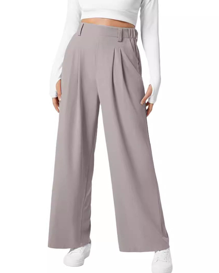 Pantaloni eleganti e comodi per donna, a vita alta e gamba ampia in tessuto waffle. Must-have per il tuo stile.