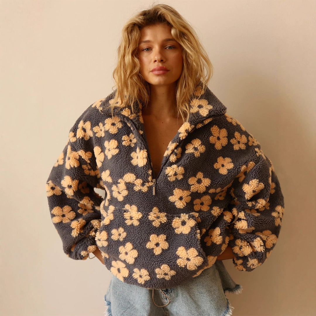 Felpa donna in pile, con tasca frontale e zip. Abbigliamento casual e comodo per autunno/inverno.