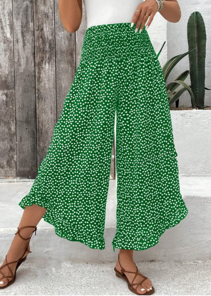 Pantaloni palazzo a pois da donna, a vita alta e gamba larga. Freschi e comodi per la primavera estate.