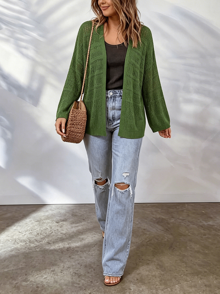 Cardigan donna traforato leggero e fresco, in un vibrante verde, ideale per primavera ed estate.