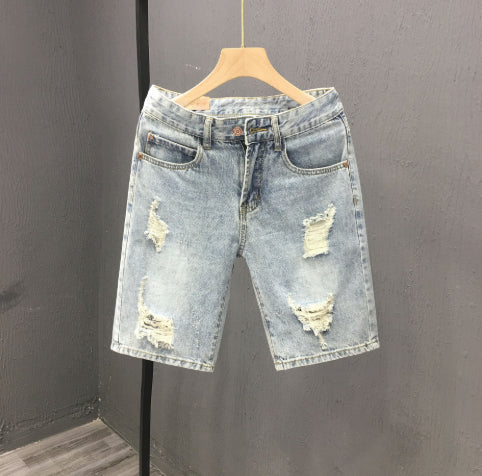 Pantaloncini uomo estivi blu strappati, vita media, per un look casual e contemporaneo.