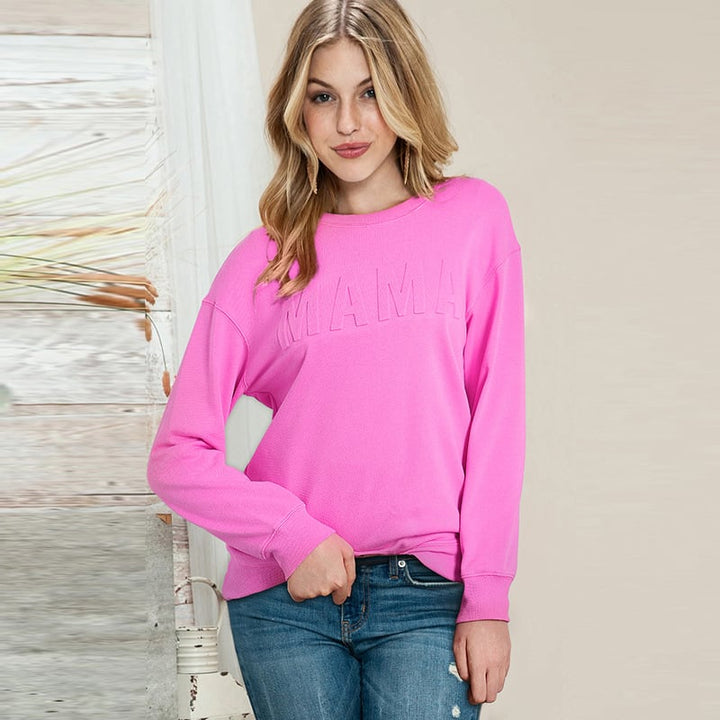Maglione donna oversize rosa con stampa lettering e scollo rotondo, perfetto per un look casual e alla moda.