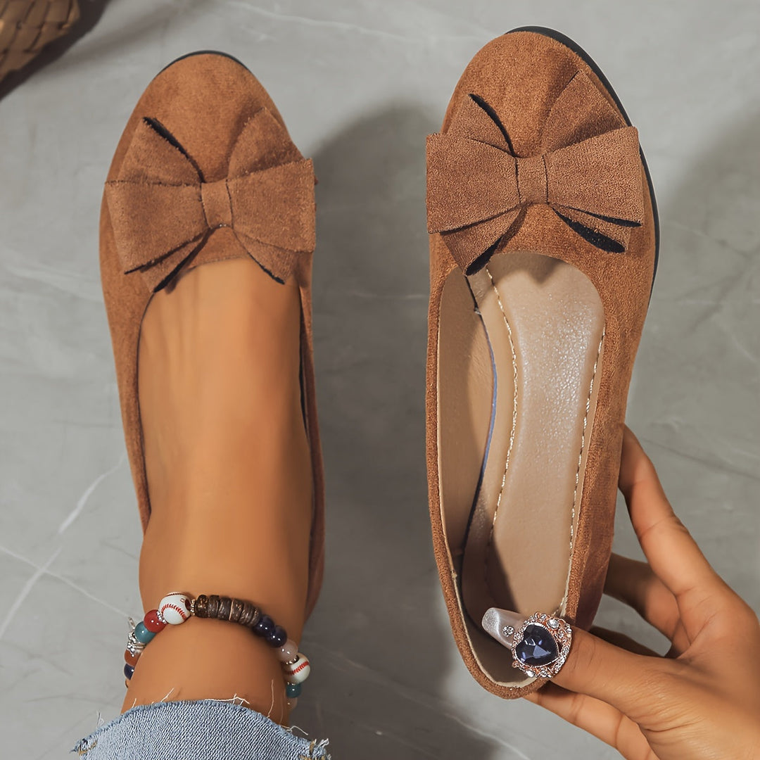 Ballerine moda donna con fiocco, suola imbottita che abbraccia il piede.